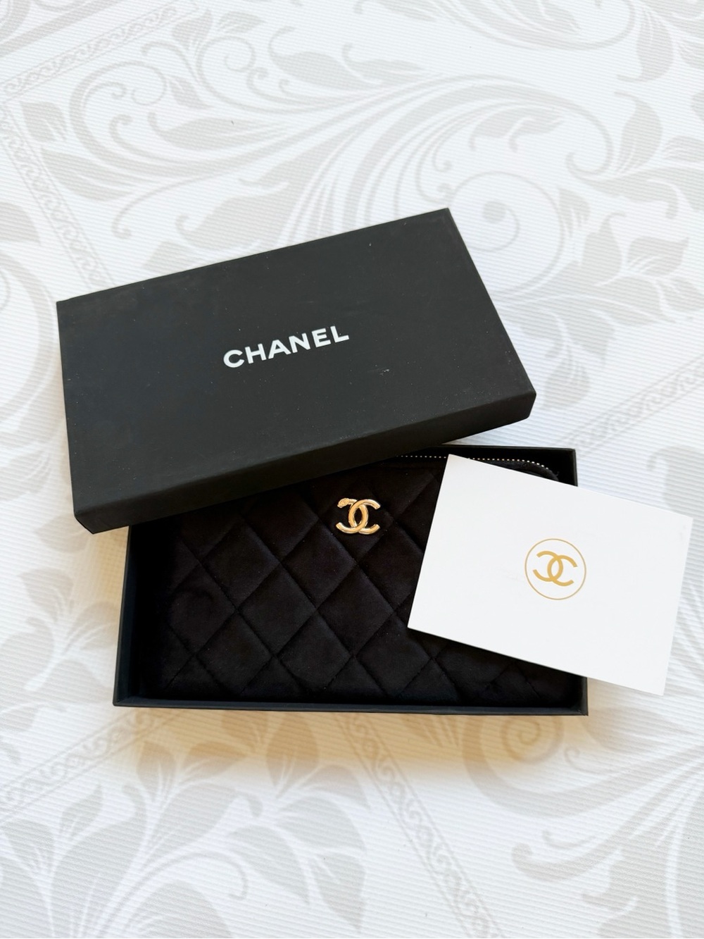 CHANEL Black Quilted Cosmetic Pouch with Gold CC Emblem